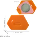 Detailed view of the multi-purpose magnetic sewing guide with clear scales and measurements. - Orange