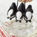 Silicone penguin egg boiler holder rack, kitchen cooking helper and boiling egg stand tool. - 15x12x12.5cm