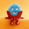 Cute smiley sponge holder with legs, ideal for kitchen sink sponge storage organization. - Red