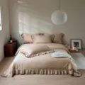 Cozy beige ruffle bedding set with soft duvet cover and pillowcases for elegant bedroom decor. - Verdant Flora / Four-piece Bedsheet Set For 1.5m Bed