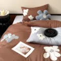 Close-up detail of the 100s long-staple cotton towel embroidery bedding set in elegant tones. - Klein Dream - Brown Blue / 1.2m Flat Sheet 3-Piece Set (Random Pillowcase Pattern)