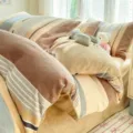 Cozy milk velvet winter four piece bedding set with brown striped design for bedroom warmth. - Milan Fashion