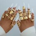 Bold statement gold-plated irregular ring set featuring organic shapes on model hands - Multi-Piece Statement Stacking Ring Set (6538802HB)