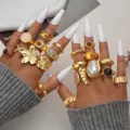 Boho chunky gold ring set featuring baroque pearl and colorful enamel details - Liquid Metal Flower Artificial Pearl Enamel Ring Set (6663901HB)