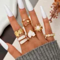 Bohemian vintage gold enamel ring set for women with adjustable sun and flower motifs. - Six-Piece Gold-Tone Star Moon White Enamel Open Style (6663201HB)