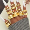 Bohemian chunky gold ring set with irregular patterns and red gemstone accents - Ten-Piece Gold-Tone Textured Lion Head Relief Style (6650901HB)