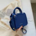 Chic blue PU leather handbag for women, stylish top handle crossbody bag for daily wear. - Blue