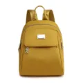 Women's yellow nylon mini backpack, fashion casual travel daypack with front pocket. - Yellow