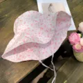 Cute pink floral summer bucket hat with wide brim and adjustable strings for sun protection. - M (54-58cm) / Pink Floral