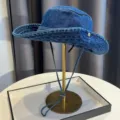 Retro washed blue denim bucket hat with windproof drawstring for outdoor sun protection main view - Dark Blue
