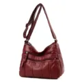 Borsa a tracolla da donna in pelle morbida rosso vino, borsa casual con tasche multiple. - Rosso