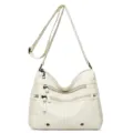 White soft leather crossbody bag for women, multi-zipper shoulder bag with adjustable strap. - White