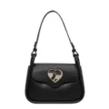 Sac à bandoulière noir pour femme en cuir avec fermoir cœur en métal chic et sangle élégante. - Noir