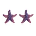 Close-up detail van paarse strass sterrenbeeld oorbellen, sprankelende kristallen. - Paars Roze Stijl (M240711012)