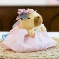Cute Capybara plush pendant toy in pink dress with floral straw hat and pearl necklace. - Capybara - Pink Dress, 12cm