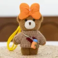 Cute brown plush bear pendant keychain with knitted sweater and big orange bow for bag. - Bear in Sweater - Brown 15 cm