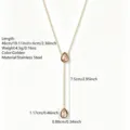 Stainless steel lariat necklace detail, pink teardrop crystal pendant, golden 18K finish. - Pink Rhinestone