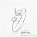 Elegant stainless steel double stone open cuff bracelet with sparkling cubic zirconia charms - Open Round Zirconia Bangle (RT138SZ-1)