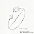 Stainless steel open cuff bracelet with heart cubic zirconia stones, elegant and stylish jewelry. - Open Heart Zirconia Bangle (RT141SZ-1)