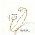 Stainless steel golden open cuff bracelet with sparkling zircon stones, elegant and stylish. - Gold Open Oval Zirconia Bangle (RT139SZ)