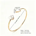 Elegant golden stainless steel open bangle bracelet featuring sparkling heart zircon stones for women. - Gold Open Heart Zirconia Bangle (RT141SZ)