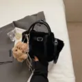 Black plush shoulder bag with cute puppy keychain, fluffy faux fur handbag for winter. - With Pendant / Black