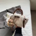 Winter fluffy plush shoulder bag for women, stylish brown leather handle crossbody handbag. - With Pendant / White