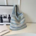 Literary knitted shoulder bag for women, trendy striped hollow woven design, relaxed large capacity. - Blue