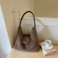Brown plush shoulder bag for women, cozy winter fluffy tote bag with black leather handles. - Coffee