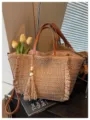 Woven straw shoulder bag detail, stylish fringe tassel decor, casual beach tote design. - Brown
