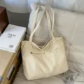 Borsa shopper in tela beige con tasca con zip, borsa a spalla capiente e casual per commuting. - Bianco avorio