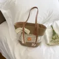 Straw shoulder bag with brown leather handles, lace bow and floral crochet for summer beach. - Khaki Hollow