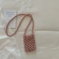 Pink woven cotton crossbody phone bag, casual hollow shoulder bag, perfect beach accessory. - With Flower Decor / Pink