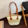 Woven straw tote bag in beige with brown leather handles, casual summer beach shoulder bag. - Off White