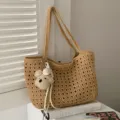 Summer casual straw woven shoulder bag with cute bear pendant, large capacity hollow beach tote. - Khaki With Pendant