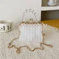 Clear beaded mini crossbody shoulder bag with gold chain strap and kiss-lock closure. - White