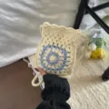 Chic beige crochet phone crossbody bag with light blue floral pattern, casual vacation style. - Round Flower Style / Blue