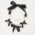 Elegante vintage multi-layer parelketting met zwarte strikken en kristallen hangers. - Zwart (M230529003)