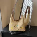 Borsa a tracolla in paglia intrecciata con ricamo elegante, grande borsa da spiaggia. - Kaki