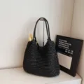 Black woven straw tote bag, large capacity shoulder bag for women, stylish beach vacation handbag. - Black