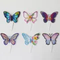 Set of 6 colorful butterfly cake toppers with floral patterns for birthday party decoration. - Butterfly Cake Forks without Flowers (Set of 6)