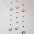 Rose gold 40th birthday party hanging garland with hollow stars and circles decoration variant. - Rose Gold 40th Birthday Garland