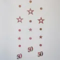 Rose gold 50th birthday hanging garland decoration with hollow stars and circles for party. - Rose Gold 50th Birthday Garland