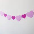 Pink and purple glitter heart garland variant for party decoration and hanging banner. - 7-Piece Glitter Rose Pink Heart Garland (4 Large Pink + 3 Medium Rose Red)