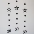 Black 30th birthday party hanging garland with hollow stars and round dot decorations - Black 30th Birthday Banner