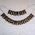 Μαύρη και χρυσή ισπανική γιορτή γενεθλίων Feliz Cumpleanos κρεμαστή διακόσμηση banner. - Ισπανικό πανό γενεθλίων με ουρά ψαριού σε μαύρο χρώμα