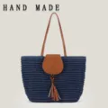 Blue hand-woven paper rope shoulder bag with brown tassel flap for beach vacation - Dark Blue