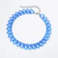 Close-up view of blue transparent acrylic heart link chain necklace, modern punk style detail. - Blue (#9)