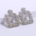 Stijlvolle geometrisch gestructureerde zilveren oorbellen voor dames, retro sieraden. - Ronde Stijl / Zilver