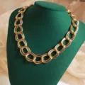 Gold chunky chain necklace close-up view, stylish metal link design for chic outfits. - Punk Chunky Chain Necklace (DW210808006) / Gold